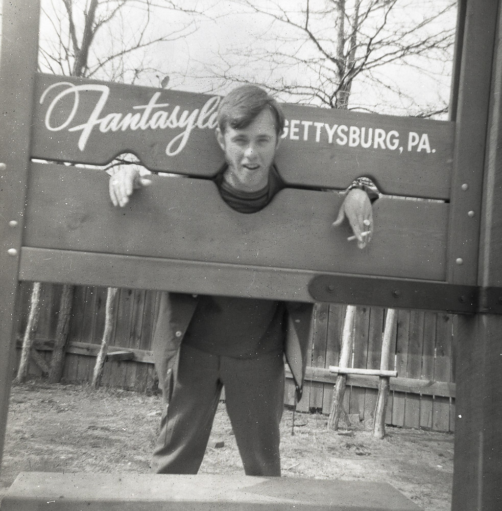 Young man posing in the "stockade"